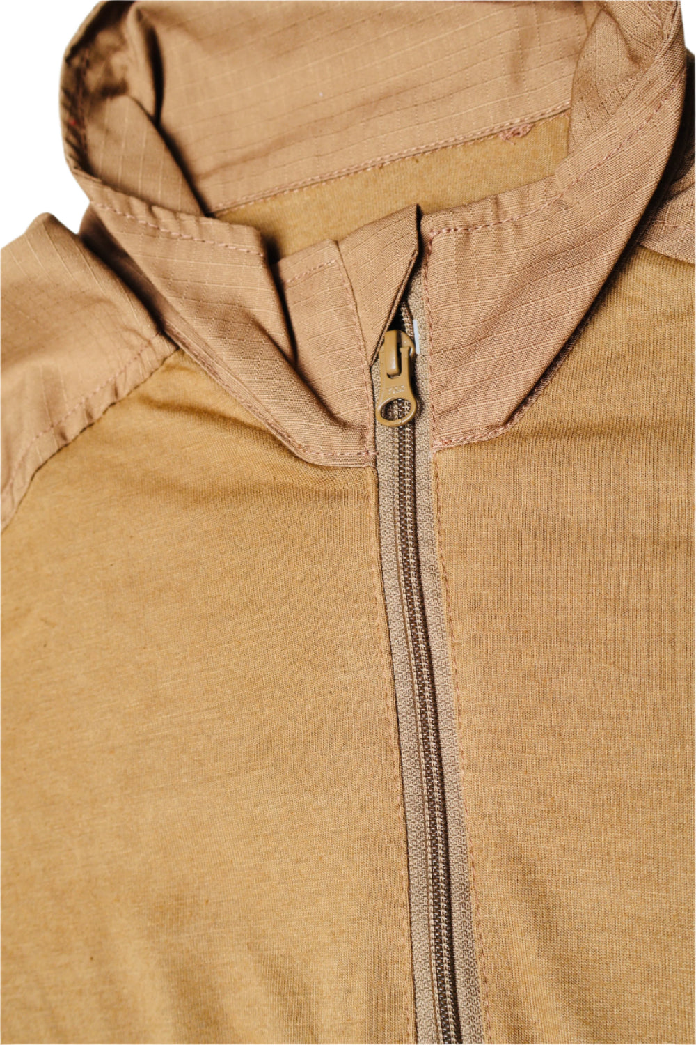 Close-up of a brown jacket with a zipper on a light gray background
