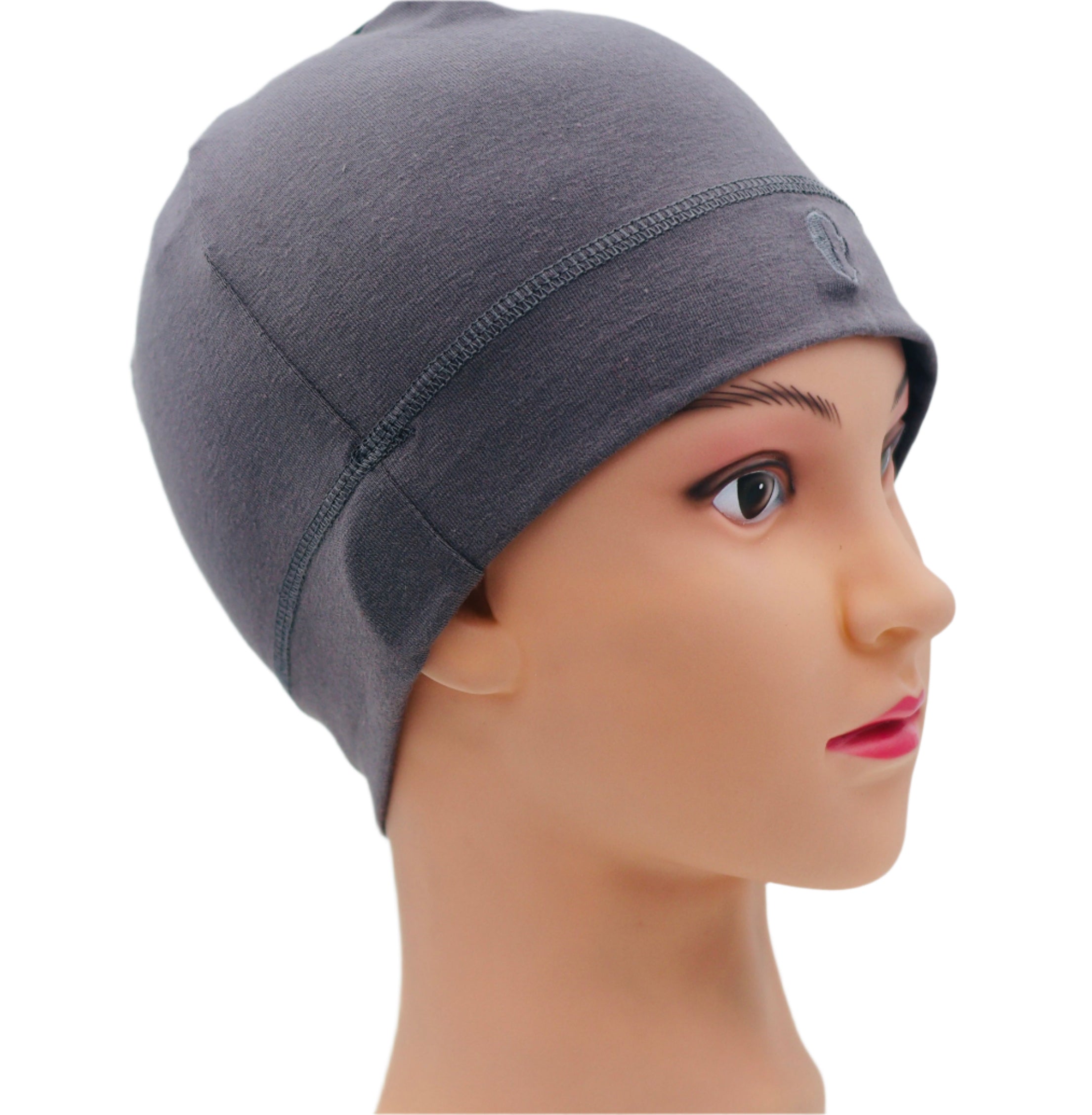 Gray beanie on a mannequin head against a plain background