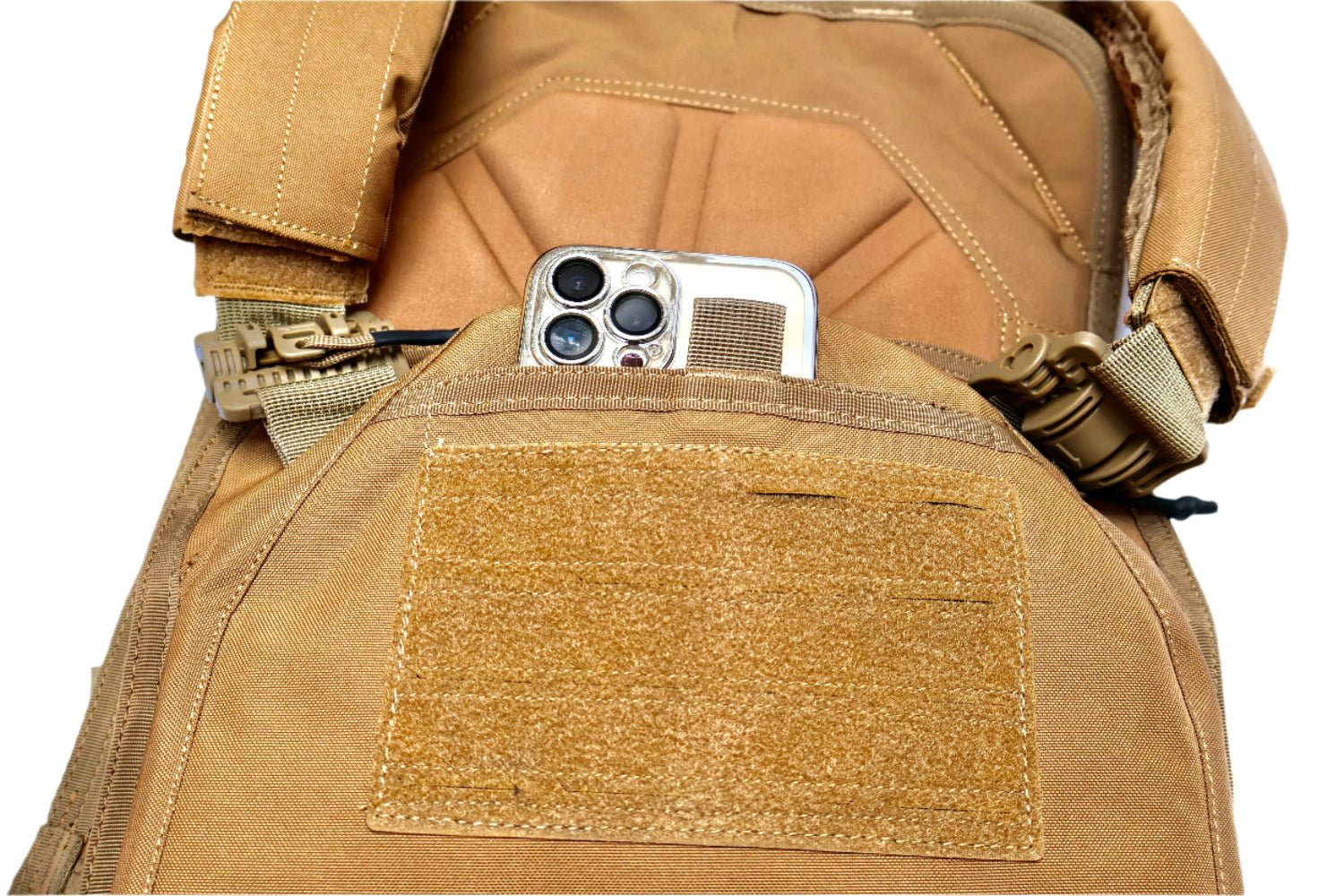 Tactical vest with a smartphone in a pocket on a white background
