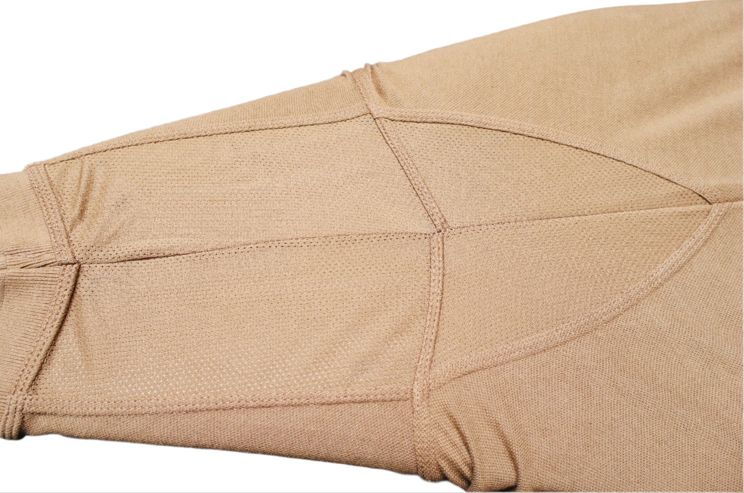 Close-up of beige Shirt underarm mesh with a white background.