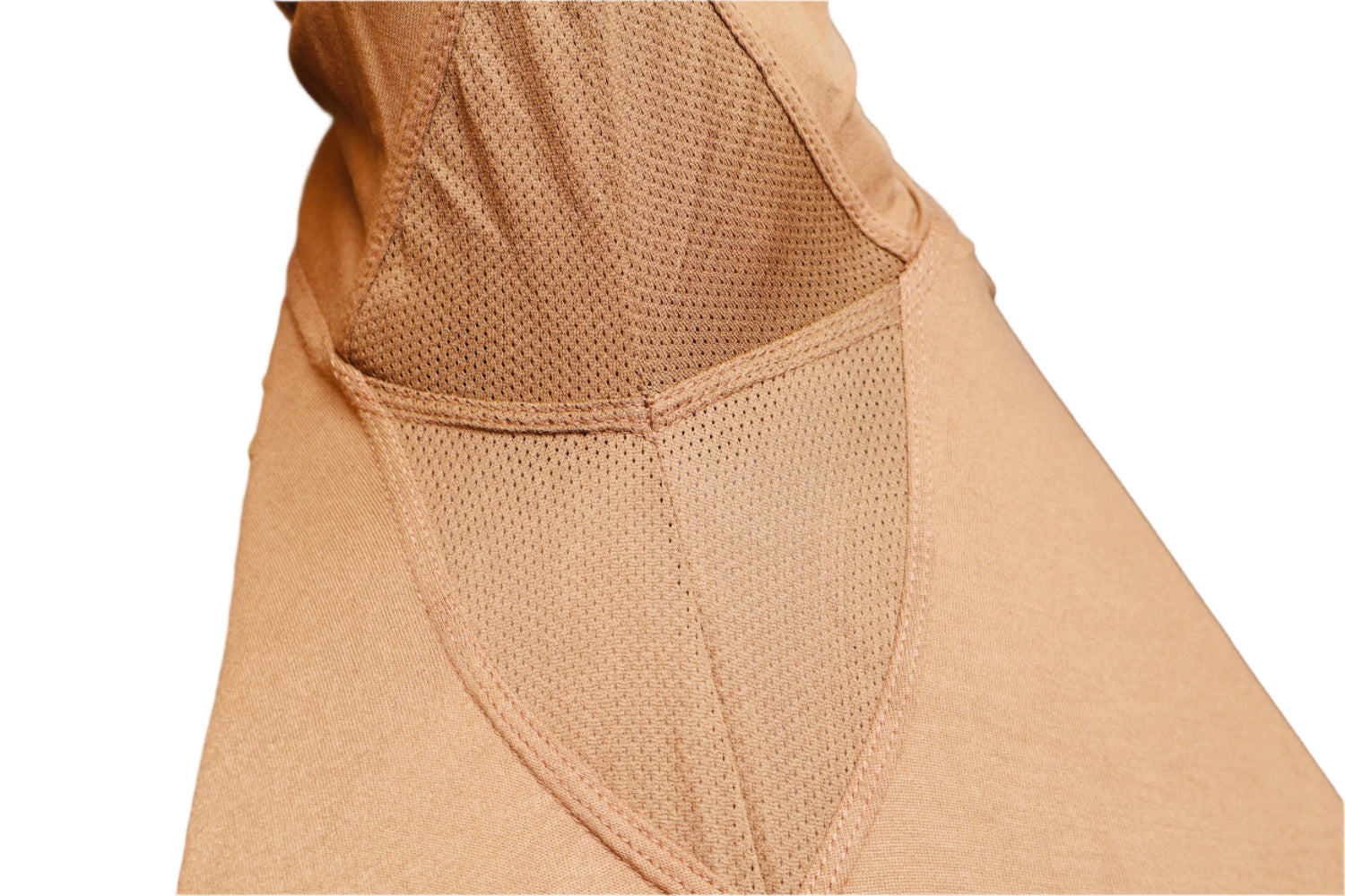 Close-up of a beige garment with mesh detailing on a blurred background