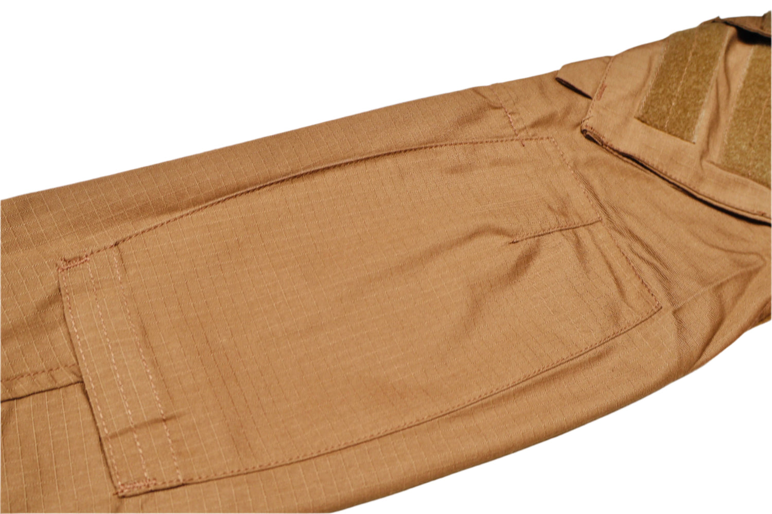 Brown tactical vest on a white surface with a blue pattern