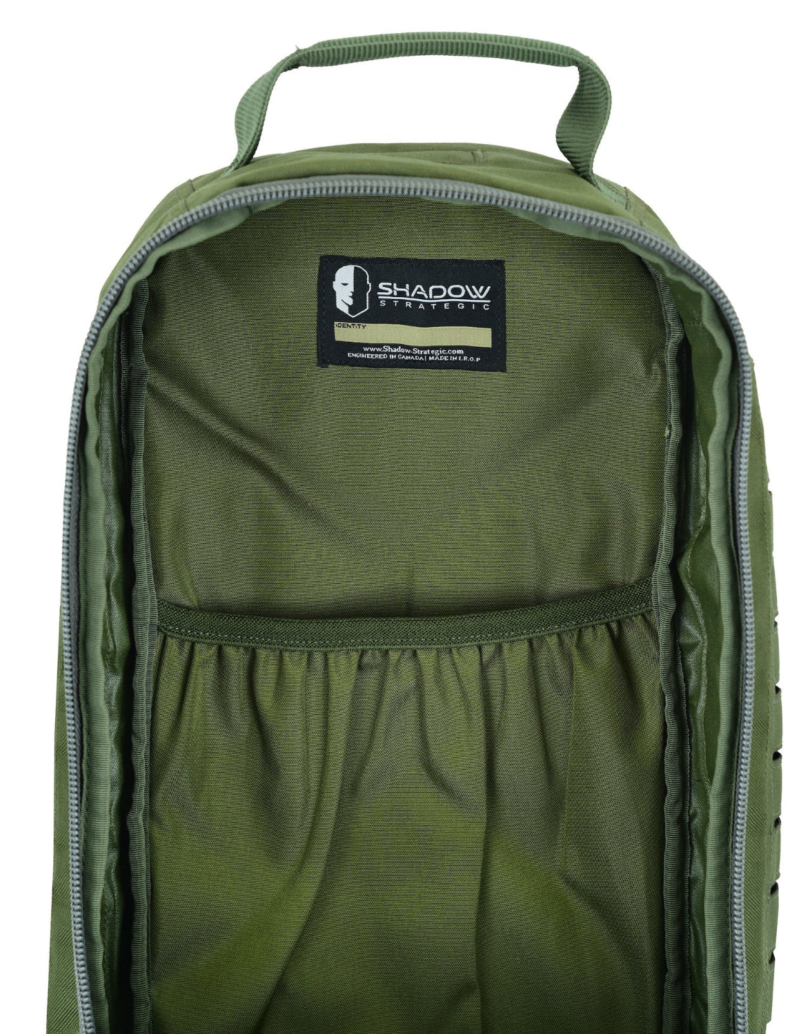 Green backpack with a visible brand label on a white background